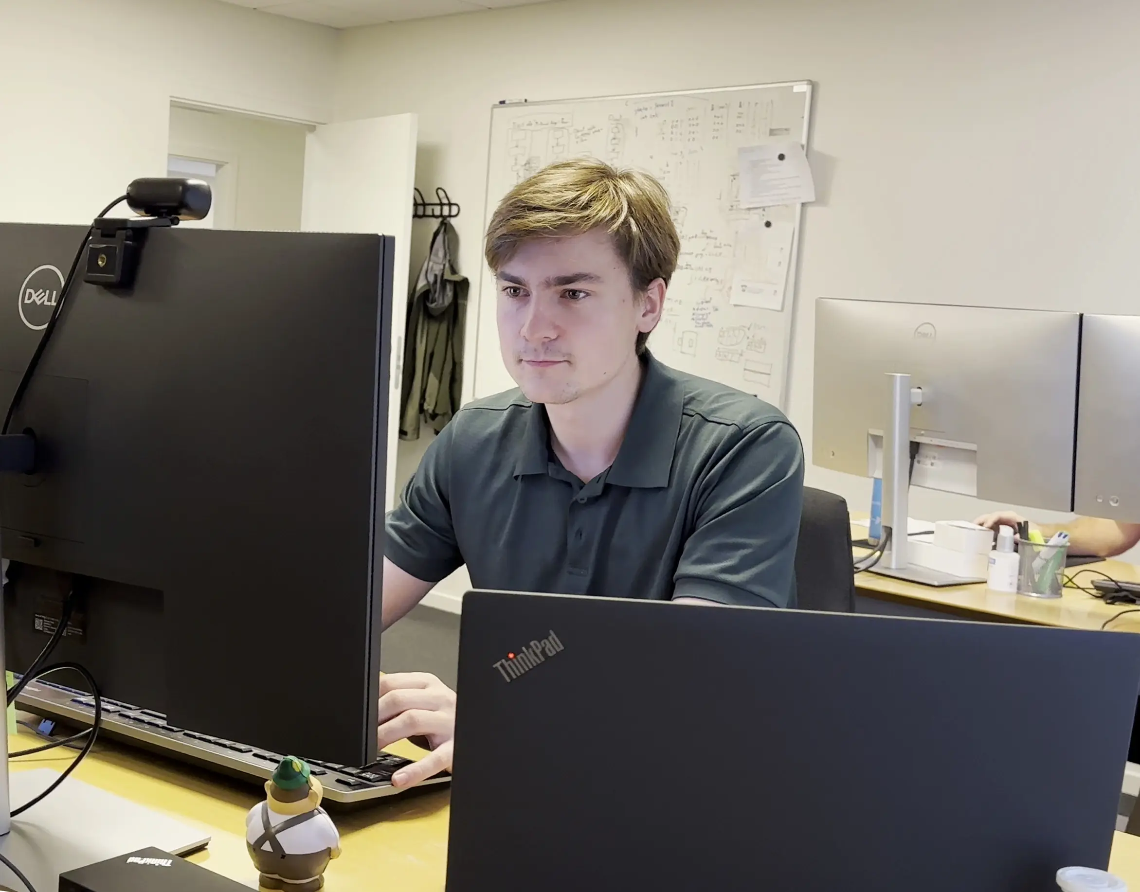 Man working at computer in office setting