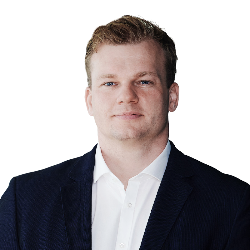 Business professional in a suit, neutral expression