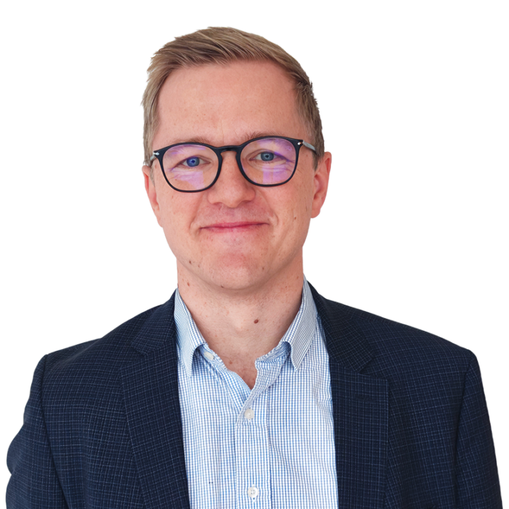 Smiling man in glasses and suit jacket